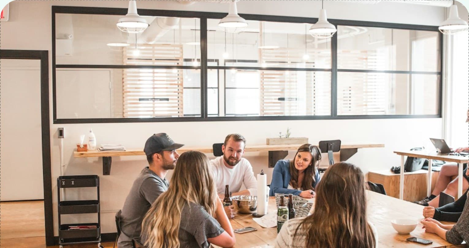 A team talking around a table in an office